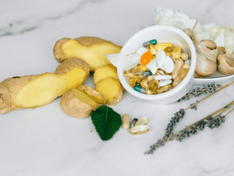 A collection of healthy foods representing the body's natural detox, questioning if detox supplements work.