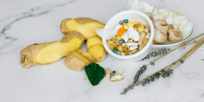 A collection of healthy foods representing the body's natural detox, questioning if detox supplements work.